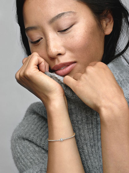 Sparkling Halo Tennis Bracelet
14k gold plating