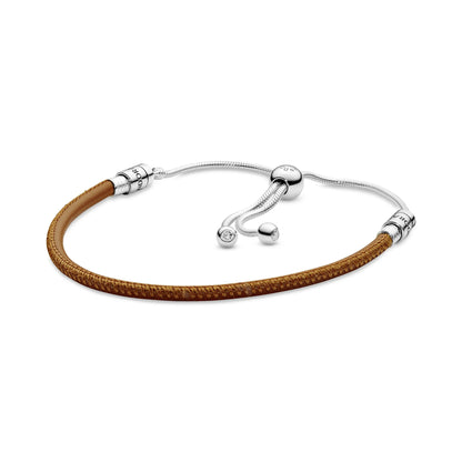 SILVER SLIDING BRACELET WITH GOLDEN TAN BRACELET AND CLEAR CUBIC ZIRCONIA