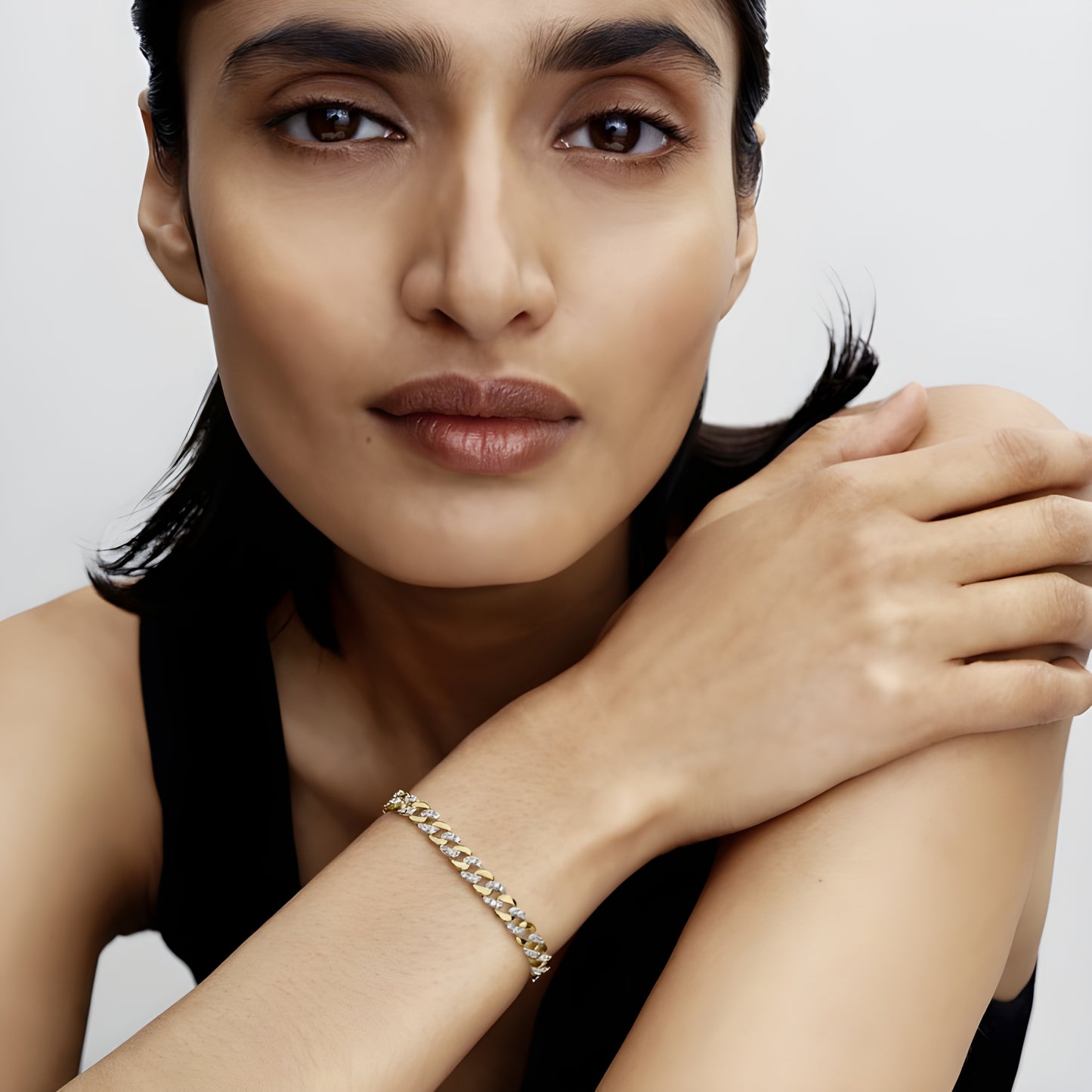 Two-tone Pavé Cuban Chain Bracelet
Sterling silver, 14k gold plating