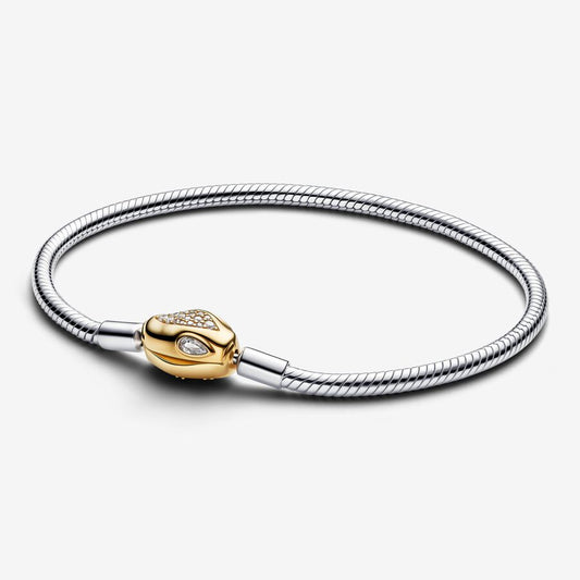 Snake Clasp & Chain Bracelet
Sterling silver, 14k gold plating