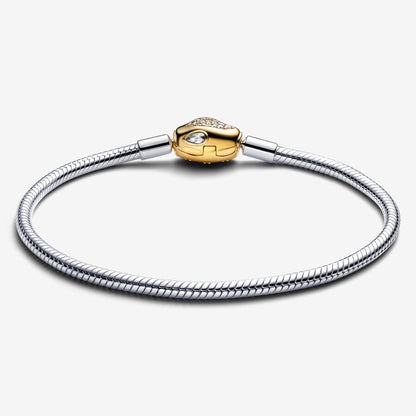 Snake Clasp & Chain Bracelet
Sterling silver, 14k gold plating
