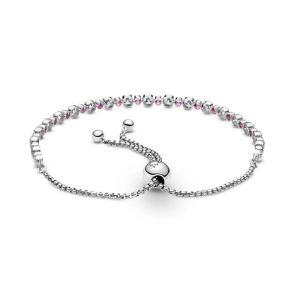 Rhodium plated sterling silver slider bracelet with clear cubic zirconia and synthetic pink sapphire