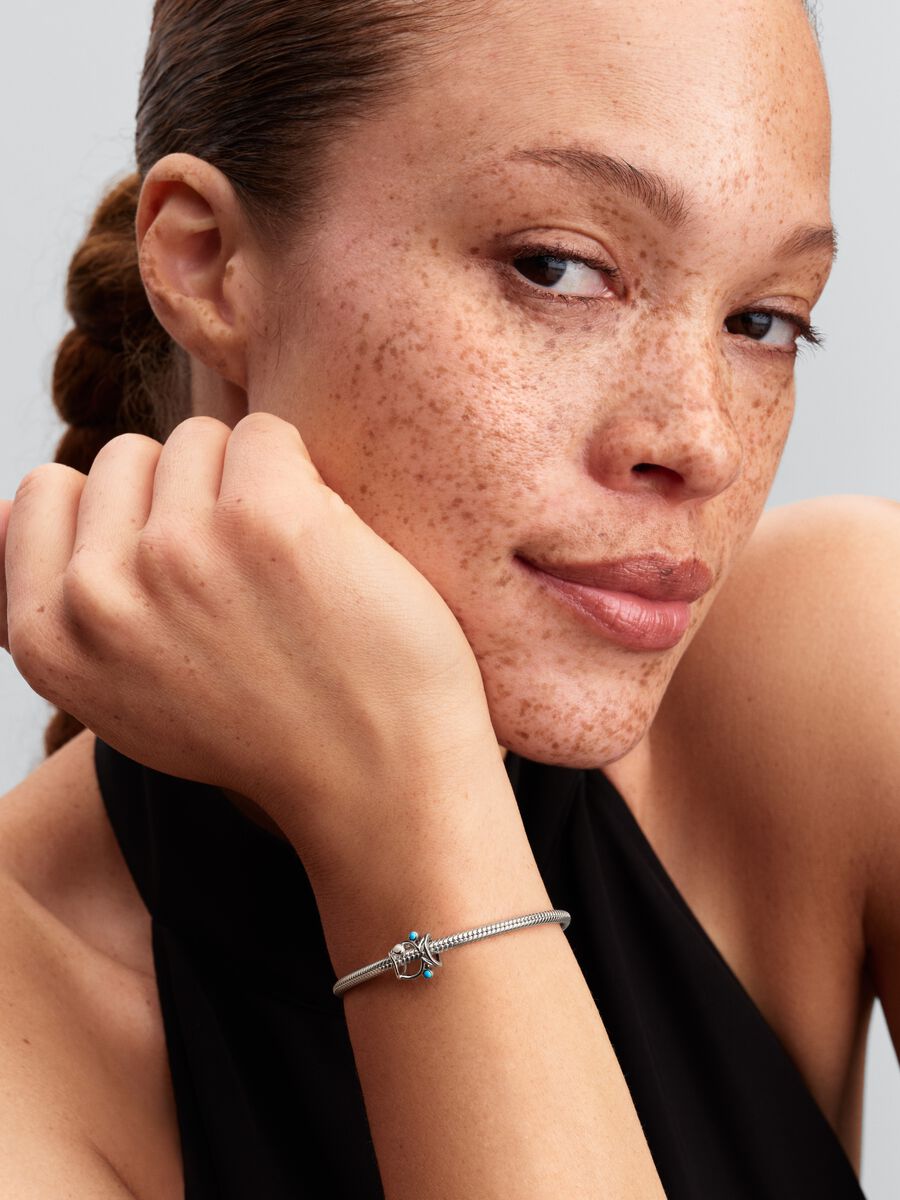 New in                                      Openwork Fish Charm