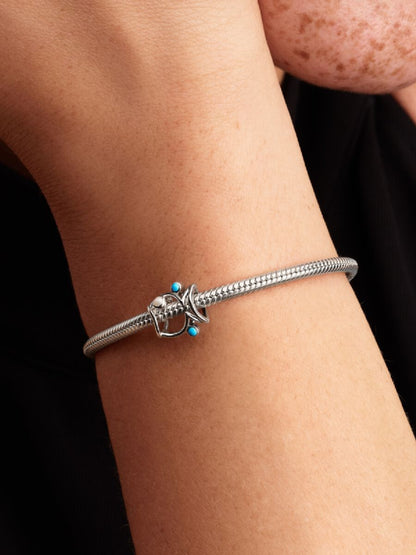 New in                                      Openwork Fish Charm