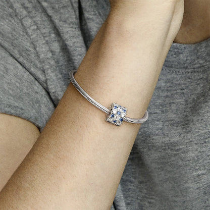 Sterling Silver Charm With Moonlight Blue Crystal And Clear Cubic Zirconia