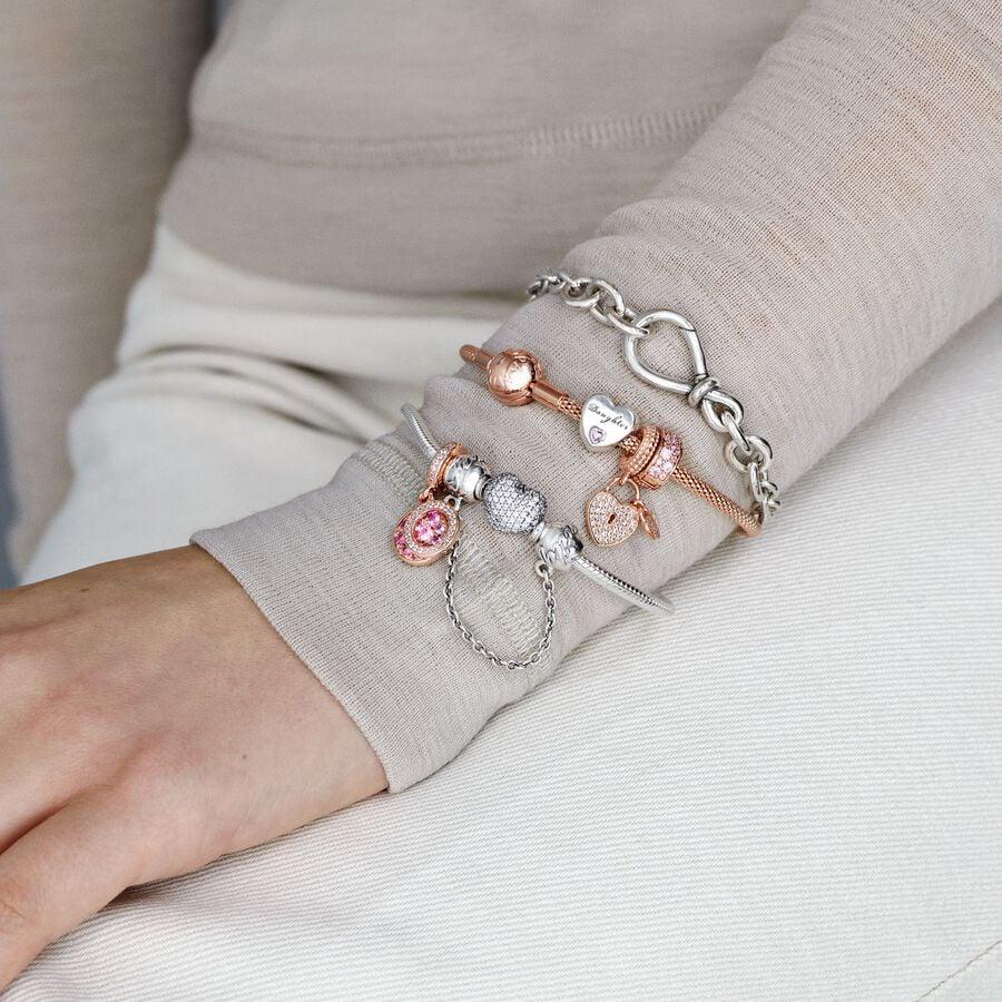 pandora bracelet with heart-shaped clasp and cubic zirconia